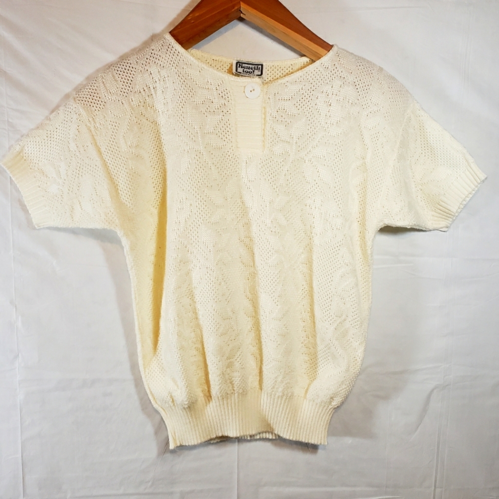 Cute white knit style vine and leaf design sweater. Size Small.